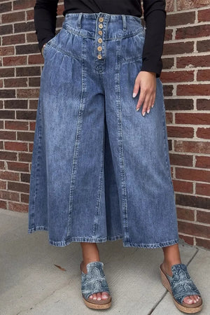 Maternity wide-leg jeans in blue denim with button-fly and high waist.