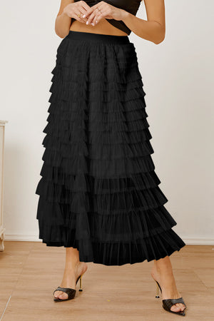 Black tiered tulle maxi skirt with ruffled layers.