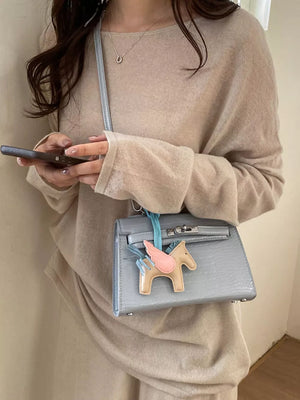 Crocodile Embossed Mini Crossbody Bag in Blue, back view