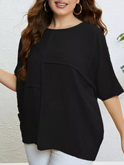 Black textured plus-size relaxed-fit t-shirt with short sleeves and a crew neck.