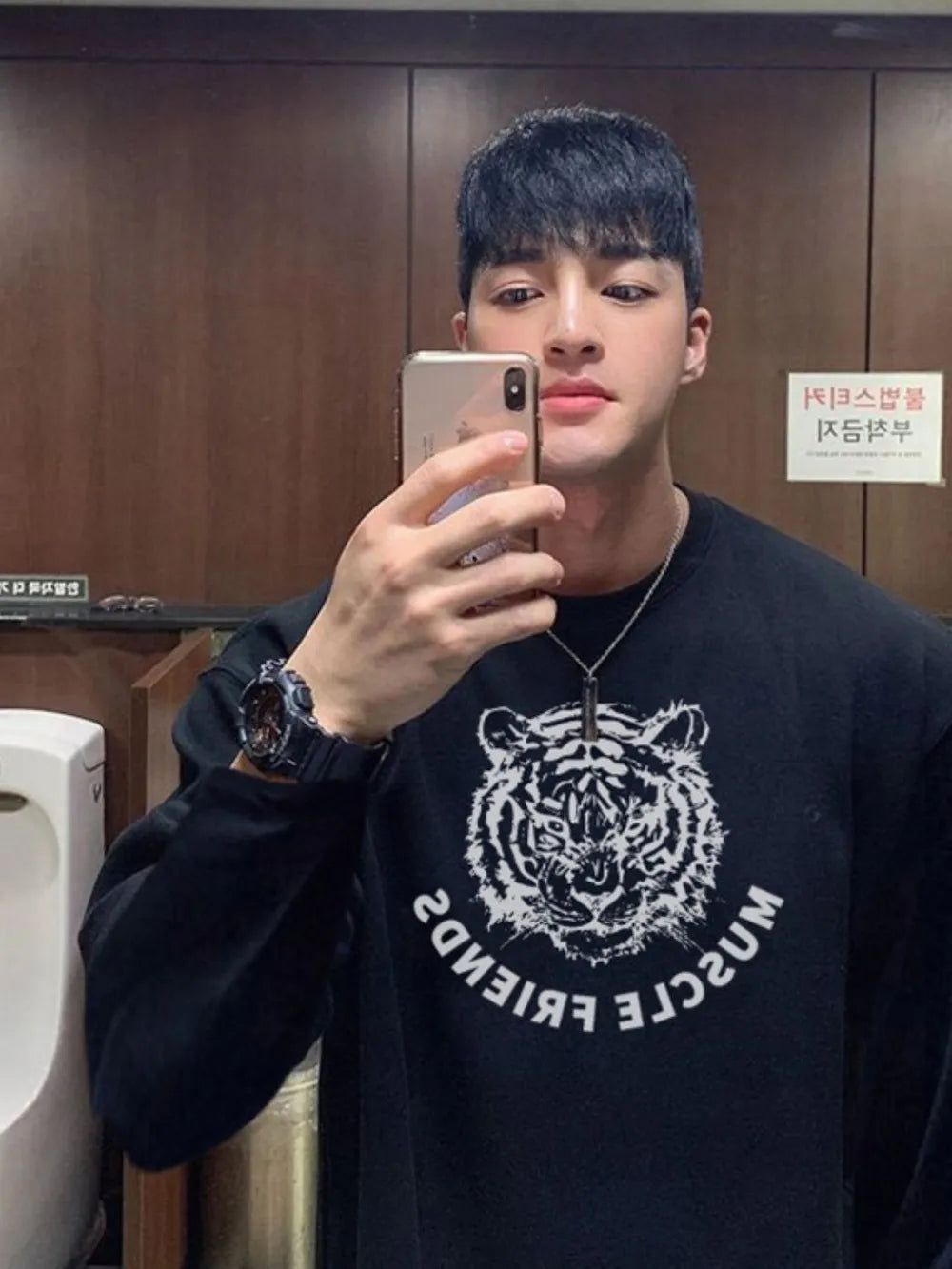 Black long sleeve tee with white tiger graphic and text