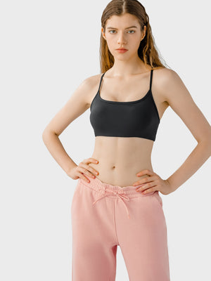 Black strappy back active crop top with a square neckline.