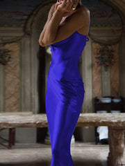 Blue cowl neck midi dress with tied back detail and body-skimming fit.