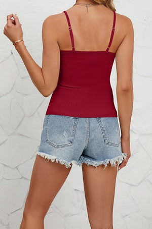Burgundy ribbed knit cami with lace trim and adjustable straps.