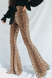 Leopard print bell bottom trousers with a flared leg, styled with a black top.