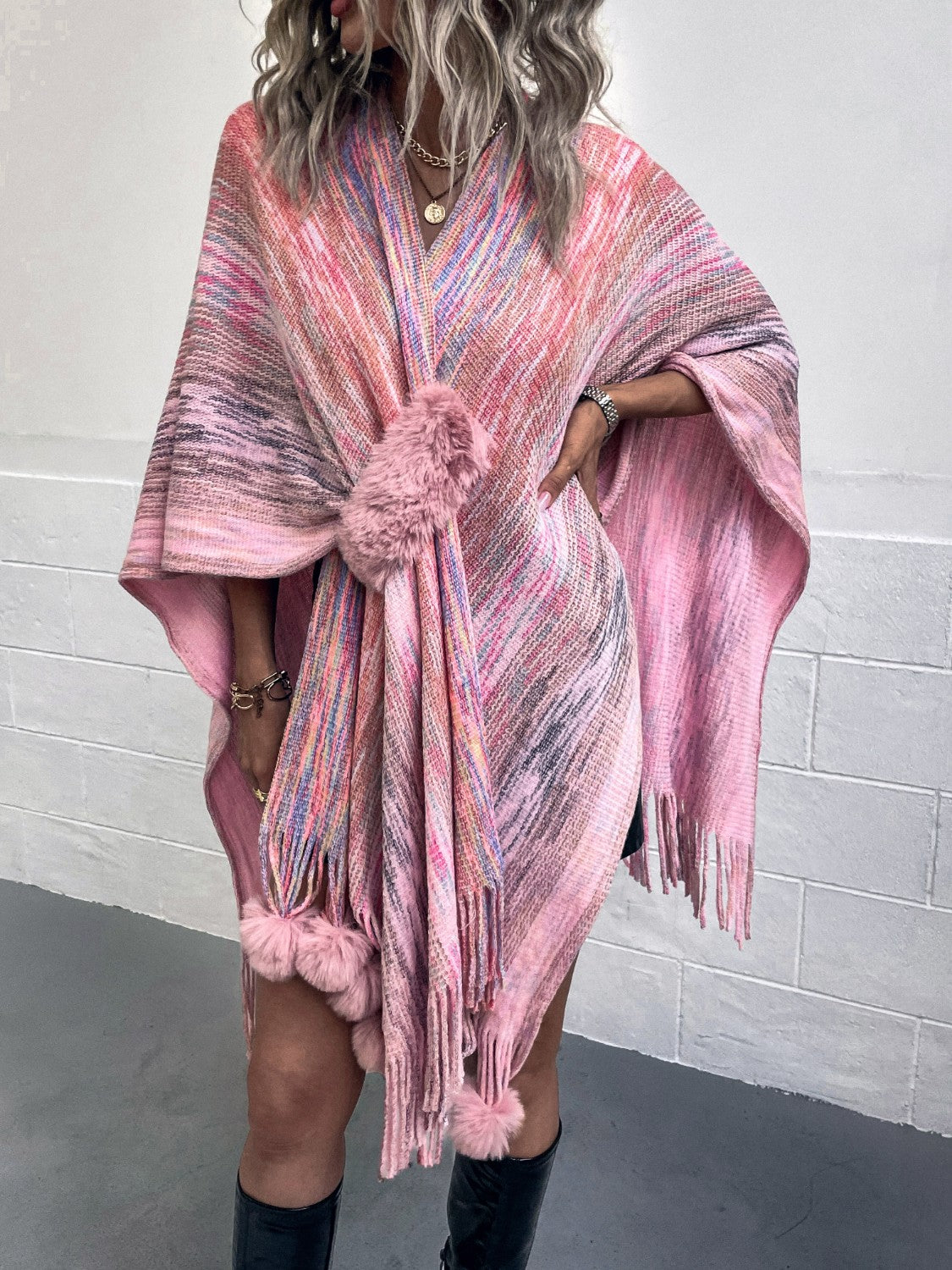 Pink multi-color knit wrap coat with pom-pom trim and fringe hem