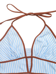 Blue and white striped maxi dress with halter neck and brown trim detail