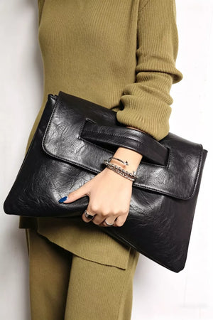 Black distressed leather envelope clutch with cut-out handle detail