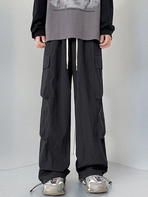 Men's black cargo sweatpants with drawstring and zip pockets