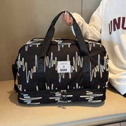 Black textured Oxford duffel bag with colorful wave pattern and dual zippered compartments.