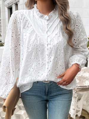 White eyelet embroidered blouse with ruffle collar and button front.