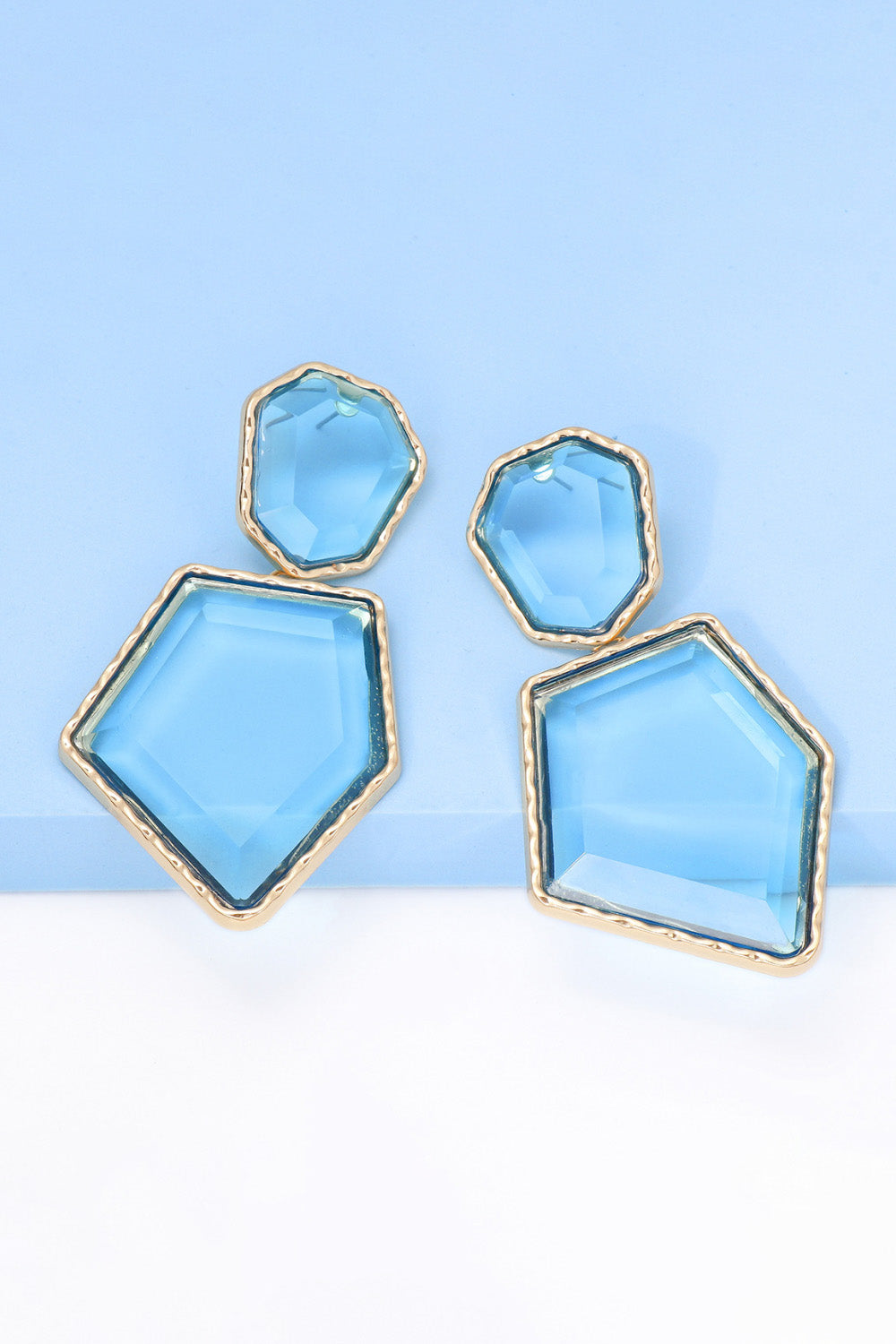 Light blue resin facet drop earrings with gold trim