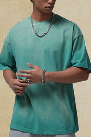 Oversized washed tee in Deep Teal with a relaxed fit and crew neck.