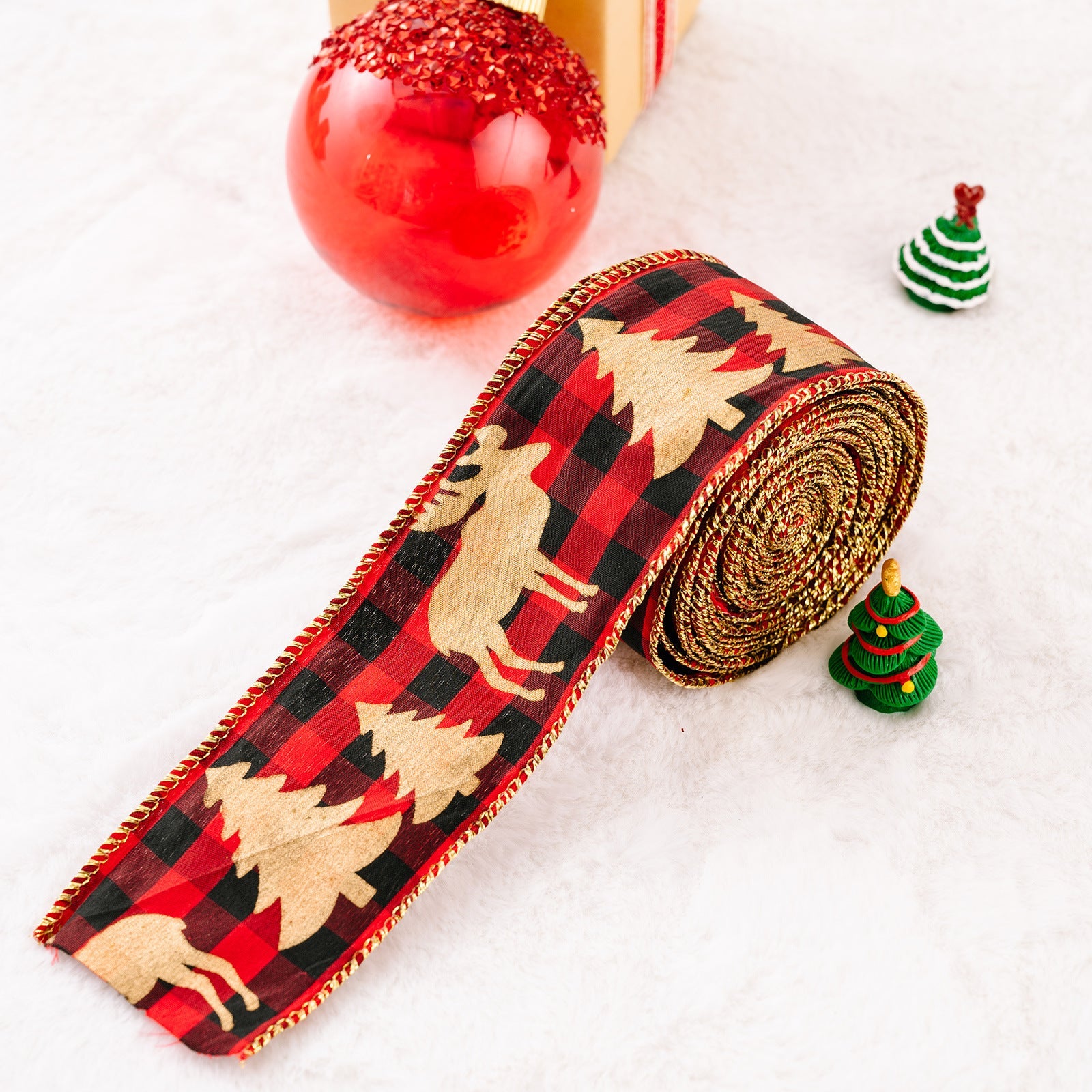 Festive red and black buffalo plaid ribbon with gold reindeer and trees, gold trim.