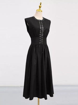 Black midi dress with lace-up detail and elastic waistband.