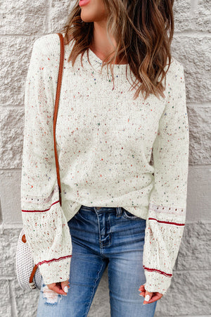 White speckled knit sweater with contrast cuff detail and crew neck