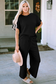 Black textured knit tee and wide leg pants set with drawstring waist