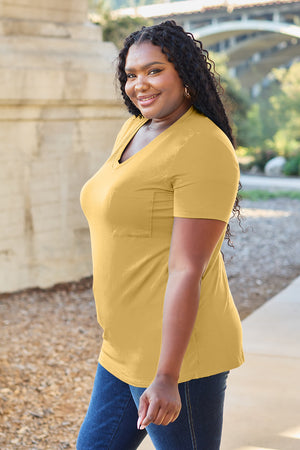 Yellow V-neck pocket tee with short sleeves and a relaxed fit.