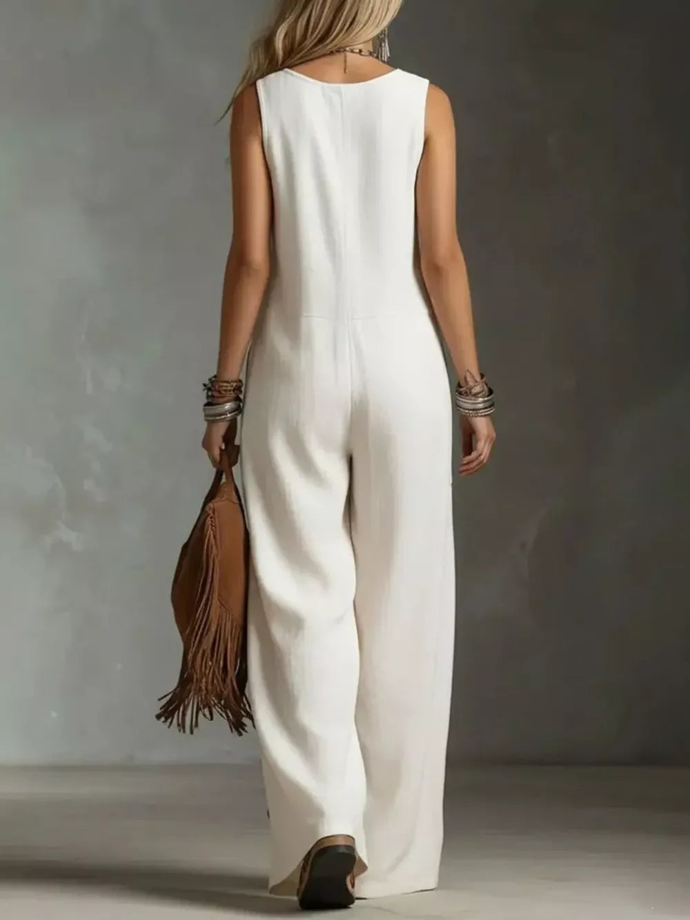 White wide-leg jumpsuit with pockets, sleeveless, round neck, back view