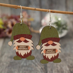 Merry Christmas gnome wood dangle earrings in matcha green with festive details.