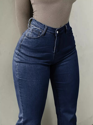 Dark blue denim maternity jeans with pockets and a sculpted flare leg.