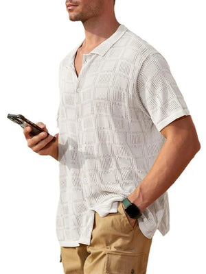 White open-knit resort shirt with geometric texture, button-down front and short sleeves.