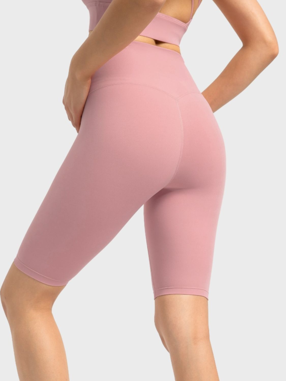 Sculpted Active Bike Shorts in Dusty Pink with a V-seam detail.
