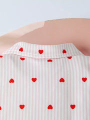 White cotton blend bodysuit with pink stripes and red hearts.