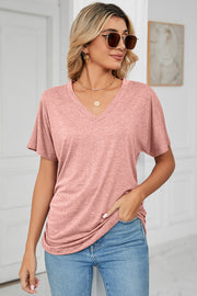 Dusty pink v-neck tee with short dolman sleeves and side ruching detail.