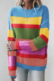 Rainbow stripe knit crewneck sweater with crew neckline and long sleeves.