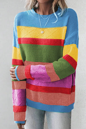 Rainbow stripe knit crewneck sweater with crew neckline and long sleeves.