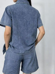 Button-up denim top and shorts set in dark blue, collared, short-sleeve, casual cotton.