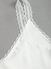 White lace cami with delicate lace trim on straps and neckline