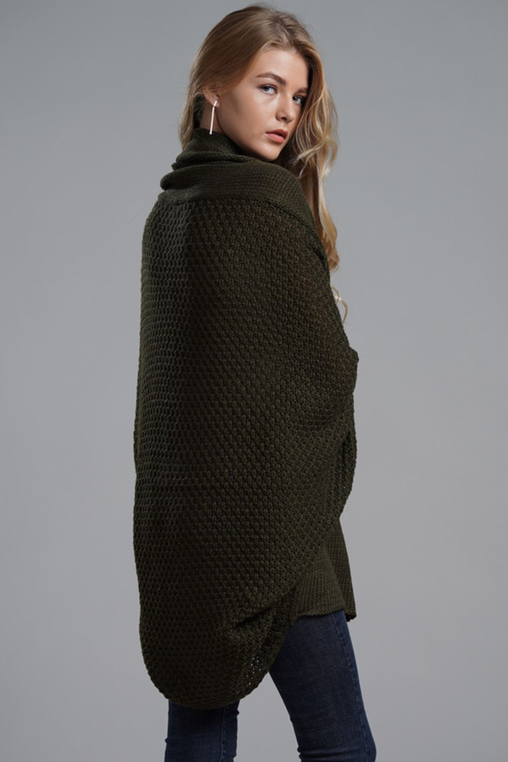 Olive green batwing knit cardigan with a textured pattern and draped front.
