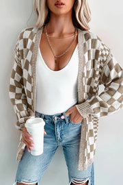 Checkerboard knit cardigan with ribbed details and button-down front in brown and white acrylic.