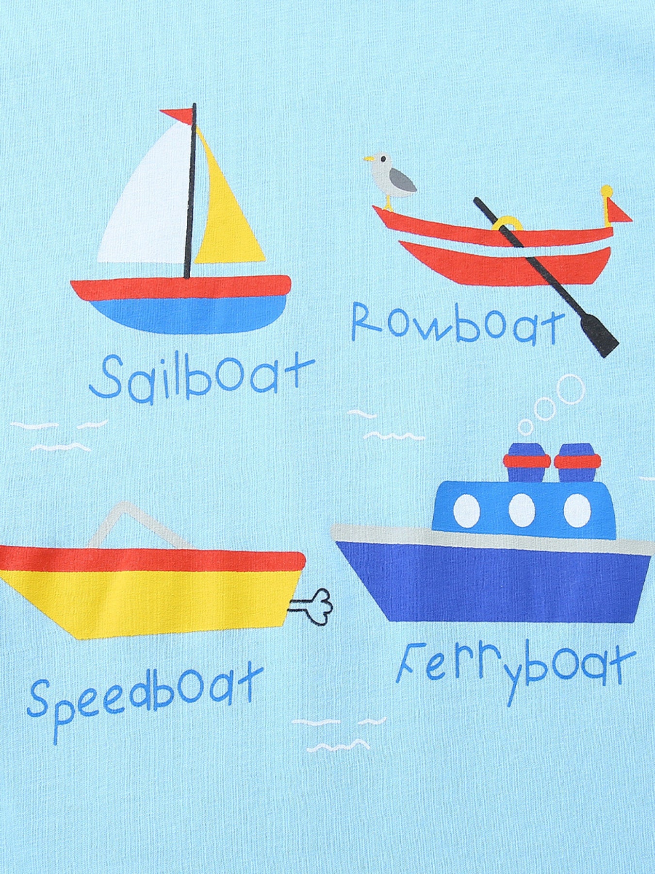 Light blue cotton t-shirt with a whimsical cartoon boat print featuring a sailboat, rowboat, speedboat, and ferryboat.