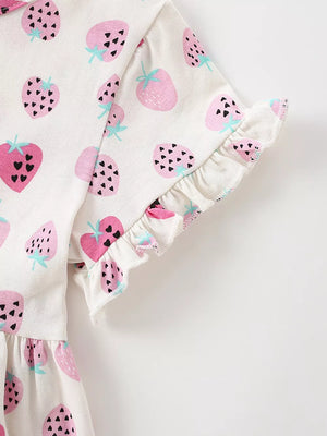 Toddler dress with strawberry print and ruffled sleeves in white cotton.