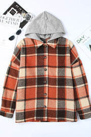 Plaid hooded shacket in orange, tan, and brown. Relaxed fit, button front, and cozy hood.
