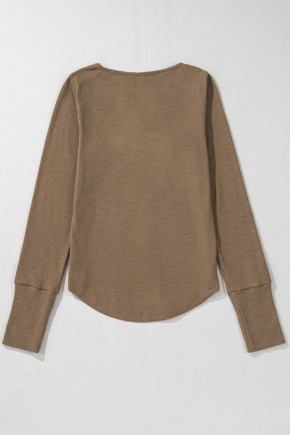 Coffee brown ribbed long sleeve Henley blouse with curved hem and cuffed sleeves.