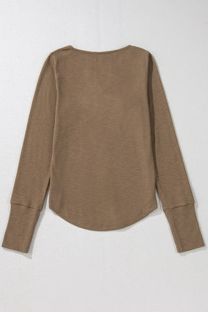 Coffee brown ribbed long sleeve Henley blouse with curved hem and cuffed sleeves.