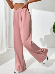 Blush pink palazzo sweatpants with V-waistline and center seams