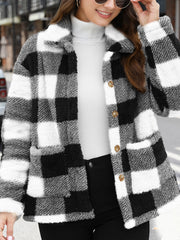 Plaid sherpa overshirt jacket in black and white buffalo check with button front and pockets.