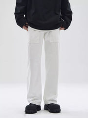 Relaxed fit white cotton chinos with patch pockets for men.