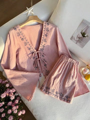 Pink embroidered tie-front top & shorts set with paisley detail.