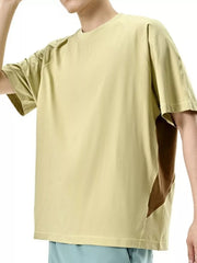 Men's chartreuse oversized t-shirt with crew neck and geometric panel detail.