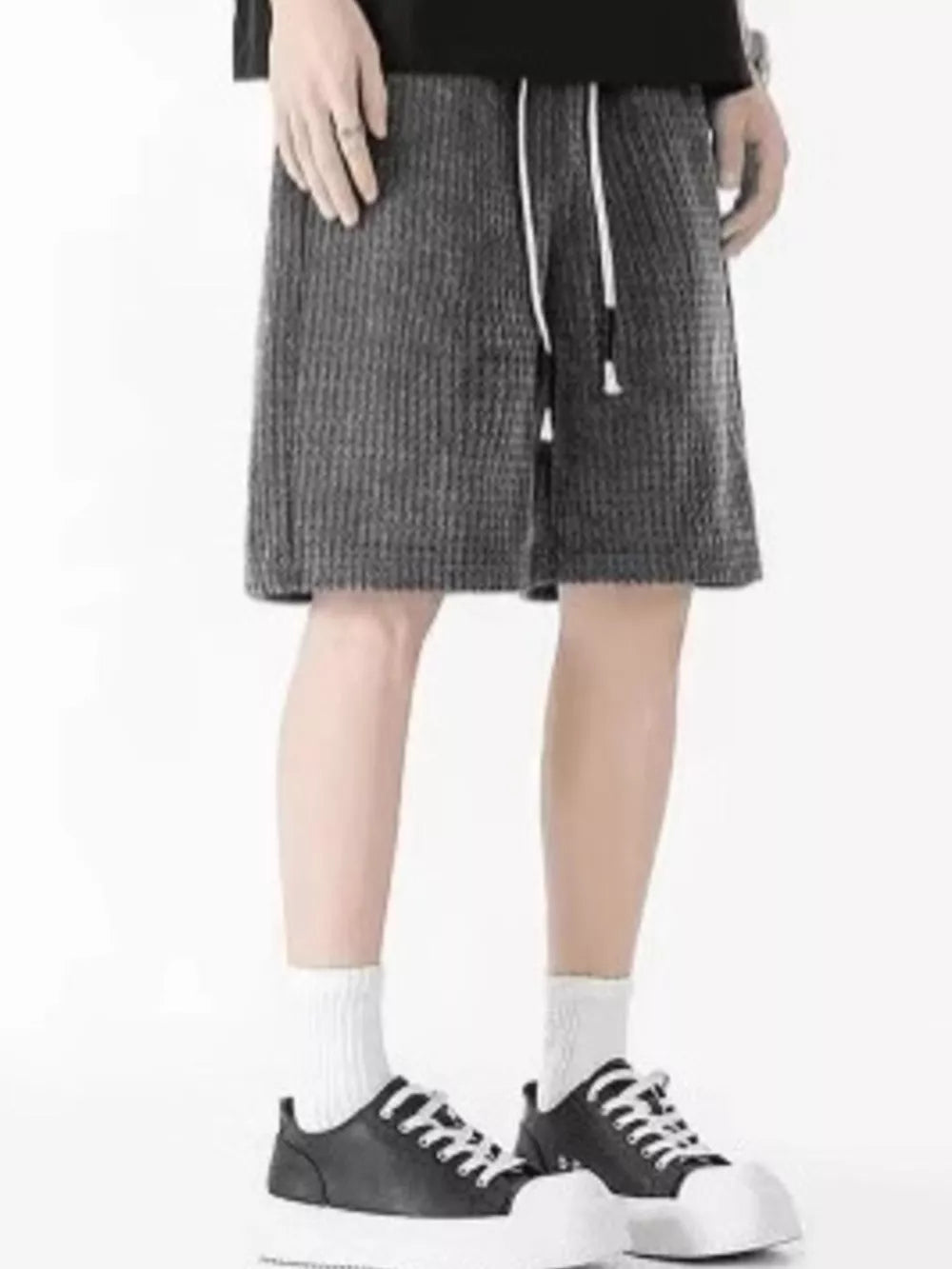 Men's dark gray waffle-knit casual shorts with drawstring waist.
