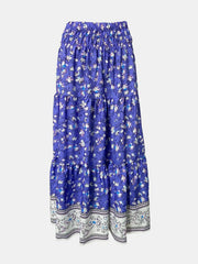 Maxi tiered skirt in blue with a white floral print and border detail.