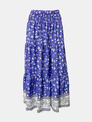 Maxi tiered skirt in blue with a white floral print and border detail.