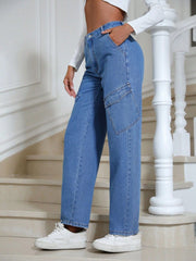 Medium wash denim cargo pants with angled pockets and straight leg cut.