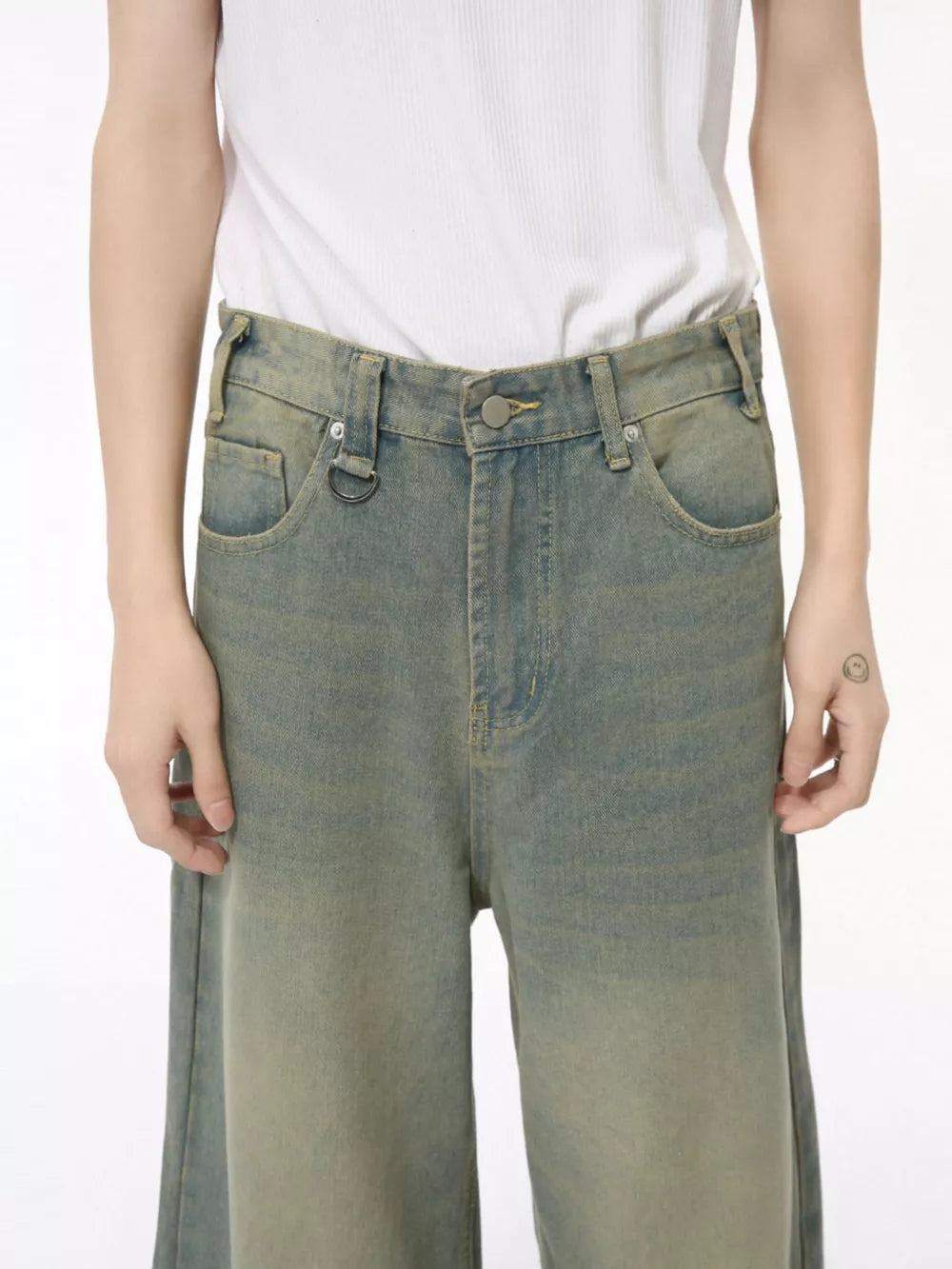 Wide leg jeans in air force blue cotton blend with button fly and distressed wash.